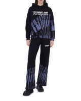 Comme Des Fuckdown Abstract Print Palazzo Pants with Bold Logo