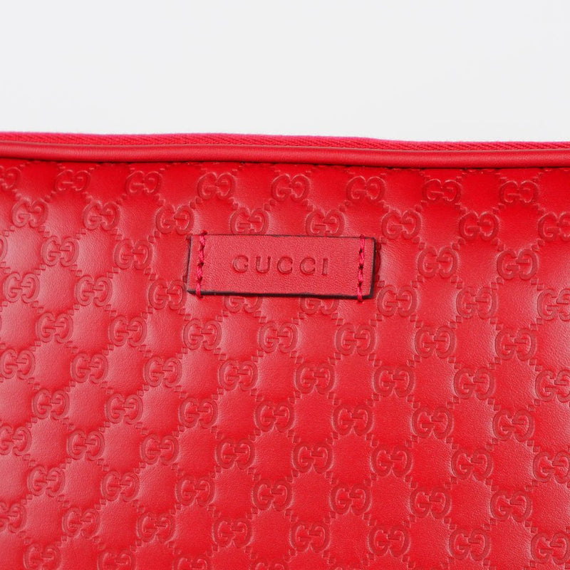 Gucci Elegant Microguccissima Leather Clutch in Red