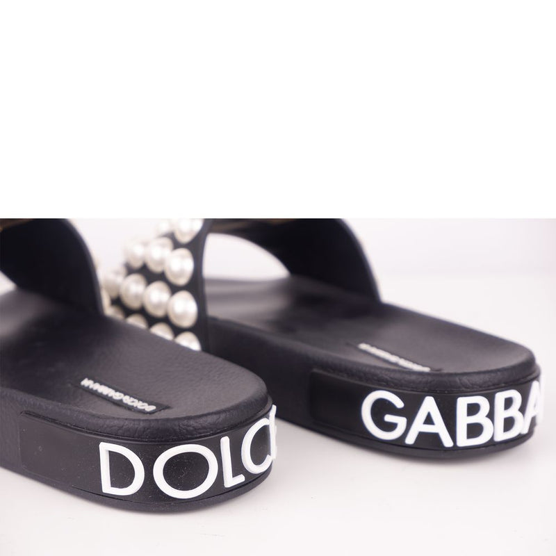 Dolce & Gabbana Chic Black Leather Slippers with Pearl Detail